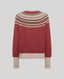 A long-sleeve knit sweater shown from the back, featuring a solid dusty red body with a multicolor geometric Fair Isle pattern across the shoulders and a contrasting cream ribbed hem and cuffs.