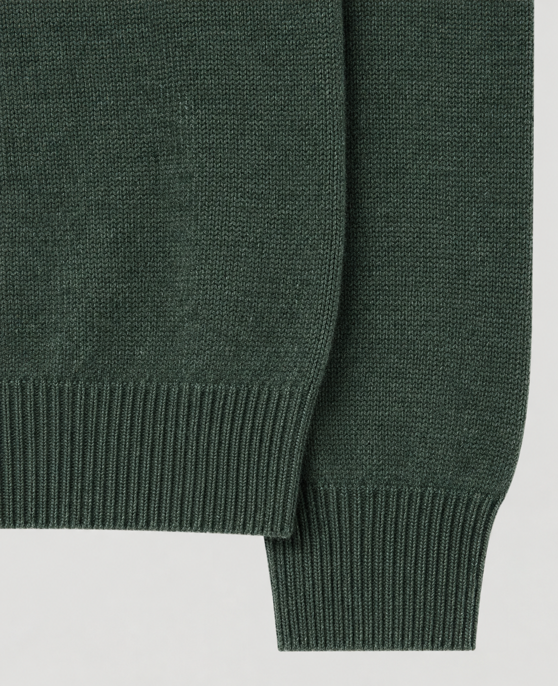 Cuff of mens green jumper