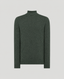 A dark forest green knit turtleneck sweater displayed on a neutral light gray background.