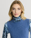Close-up of Model wearing Highgrove Recycled Cashmere Round Neck Tank in Blue with a silk blouse 