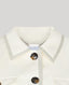 Close-up of collar detail on white utility jacket 