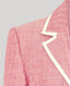 Close-up of a pink textured fabric on a gray background