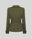 A sage green tailored jacket shown from the back, featuring a structured collar, defined shoulder lines, and a peplum-like waist with buttoned cuffs, set against a solid light gray background.