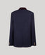 The back view of a navy blue blazer with a contrasting dark red inner collar and gold button accents on the cuffs, shown against a light gray background.