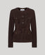 Brown suede jacket with multiple pockets and buttons on a light gray background