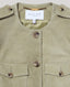 Light green suede jacket with button details and 'Really Wild London' label on a gray background