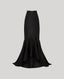 A black high-low mermaid-style skirt with a textured crinkle fabric, displayed against a solid light gray background.