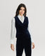 Model wearing the Mayfair Velvet Waistcoat in Midnight Navy Blue with silk blouse and velvet trousers 