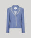 Blue blazer with white trim on a light gray background