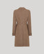 A brown wool-blend coat shown from the back, featuring a structured collar, long sleeves, and buttoned cuffs, set against a solid light gray background.