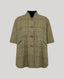 A cape in a beige, brown, and green tweed pattern, featuring a stand collar, button closure, and diagonal welt pockets, shown against a solid gray background.
