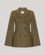 A double-breasted tweed trench cape in a textured olive-brown tweed fabric, featuring a notched lapel, six-button front closure, and flap pockets, shown against a solid light gray background.