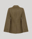 A structured olive-brown trench cape shown from the back, featuring a notched collar, long sleeves, and a central seam, photographed against a solid light gray background.