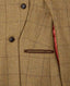 Close-up of a brown and beige windowpane check tweed cape, showing dark buttons, a welt pocket, and a red lining.