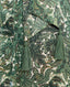 Close-up on print on Oak Print Silk Shirt Dress With Tassel in Green and Cream 