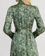 Back of Model wearing Oak Print Silk Shirt Dress With Tassel in Green and Cream