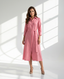 Model wearing pink linen shirt dress