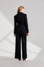 Back of model wearing a navy suit