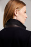 Close-up on Embossed chocolate brown leather at collar stand