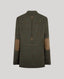 The back view of a dark olive green tweed blazer with brown elbow patches and a subtle windowpane check pattern, shown on a solid gray background.
