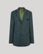 A textured blue-green blazer with a green lining and a matching pocket square, displayed on a neutral gray background.