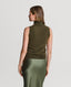 Back of Model wearing Cashmere Roll Neck Tank in Fern Green with Green Silk skirt 