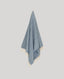 Lambswool Angora Throw in Pale Blue hanging up