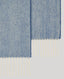 Close-up on fringe detail on pale blue lambswool angora throw