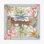 Decorative fabric square with leopards and floral patterns on a light blue background