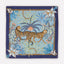 Decorative scarf with leopards and floral patterns on a blue background
