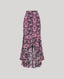 Butterfly patterned skirt on a light gray background