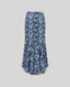Long butterfly print skirt with blue and purple pattern on a light gray background