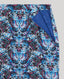 Butterfly patterned fabric with blue lining on a gray background