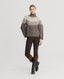 Model wearing Fairisle Roll Neck Sweater in Wildebeest Mocha Brown 