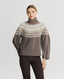 Model wearing Fairisle Roll Neck Sweater in Wildebeest Mocha Brown 