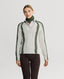Model wearing Jasmine Lambswool V-Neck Sweater in Swansdown Ivory with Loden Green Stitch 