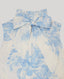Close-up on tie neck detail on blue floral sleeveless tie neck blouse
