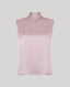 Pink silk sleeveless blouse against a light grey background
