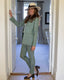Sophie Stanbury wearing Really Wild's Jackie Wool Silk Turn-up Trousers in Sea Green.