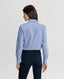 Back of Model wearing Spencer-Stretch Corduroy Shirt in Ice Blue with navy trousers 