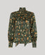 A long-sleeve button-up shirt with a high collar, featuring an all-over feather print in olive green, brown, beige, and white, displayed on a neutral gray background.