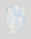 White shirt with blue floral pattern on a light gray background