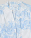 White shirt with blue floral pattern and 'Really Wild' label on a white background