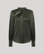 An olive green satin blouse with a high mock neck, a large bow detail at the collar, and gathered long sleeves, shown on a neutral light gray background.