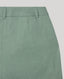 Green pants on a light gray background