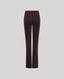 Dark brown high-waisted flare pants shown from the back on a light gray background.