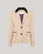 Beige blazer with green velvet trim and purple lining 