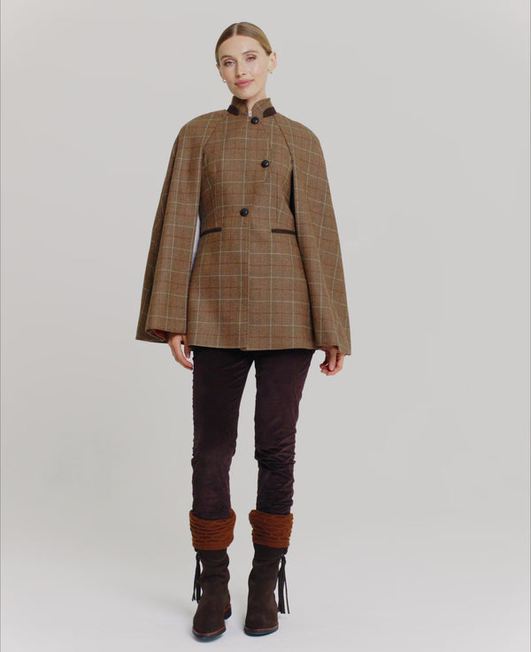 Model wearing the Balmoral Cape in Chestnut Brown Check 