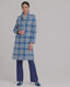 Model wearing The Lady Check Wool Coat in Butterfly Blue—a tailored, heritage-style coat, video.