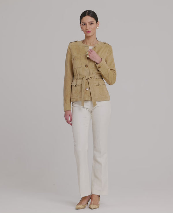 Model wearing the Robyn Suede Jacket in camel—a timeless and luxurious outerwear piece crafted from 100% suede leather, featuring a flattering fit and collarless design for a modern, feminine twist. Video view.